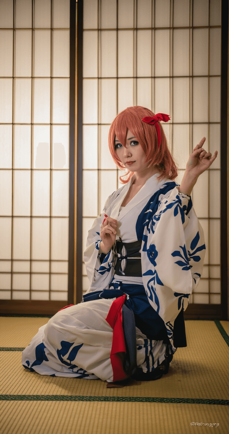 The Ultimate Guide to Creating a Perfect Sukuna Cosplay A model in full Sukuna cosplay poses in a traditional Japanese room with tatami mats and shoji screens, showcasing intricate costume details, captured with an 85mm lens at f/2.0 for soft background blur.
